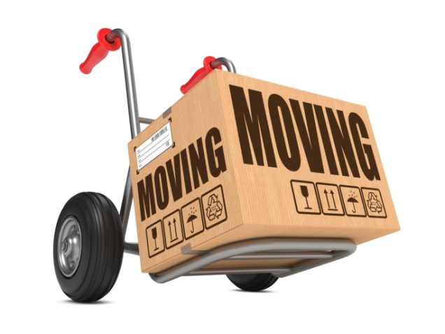 A moving truck transporting a cardboard box through Katy, TX.