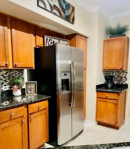 One Bedroom Apartments in Katy Texas - Model Kitchen with Stainless Refridgerator